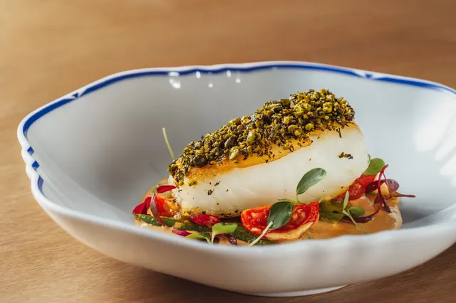 Pistachio sea bass, cherry tomatoes